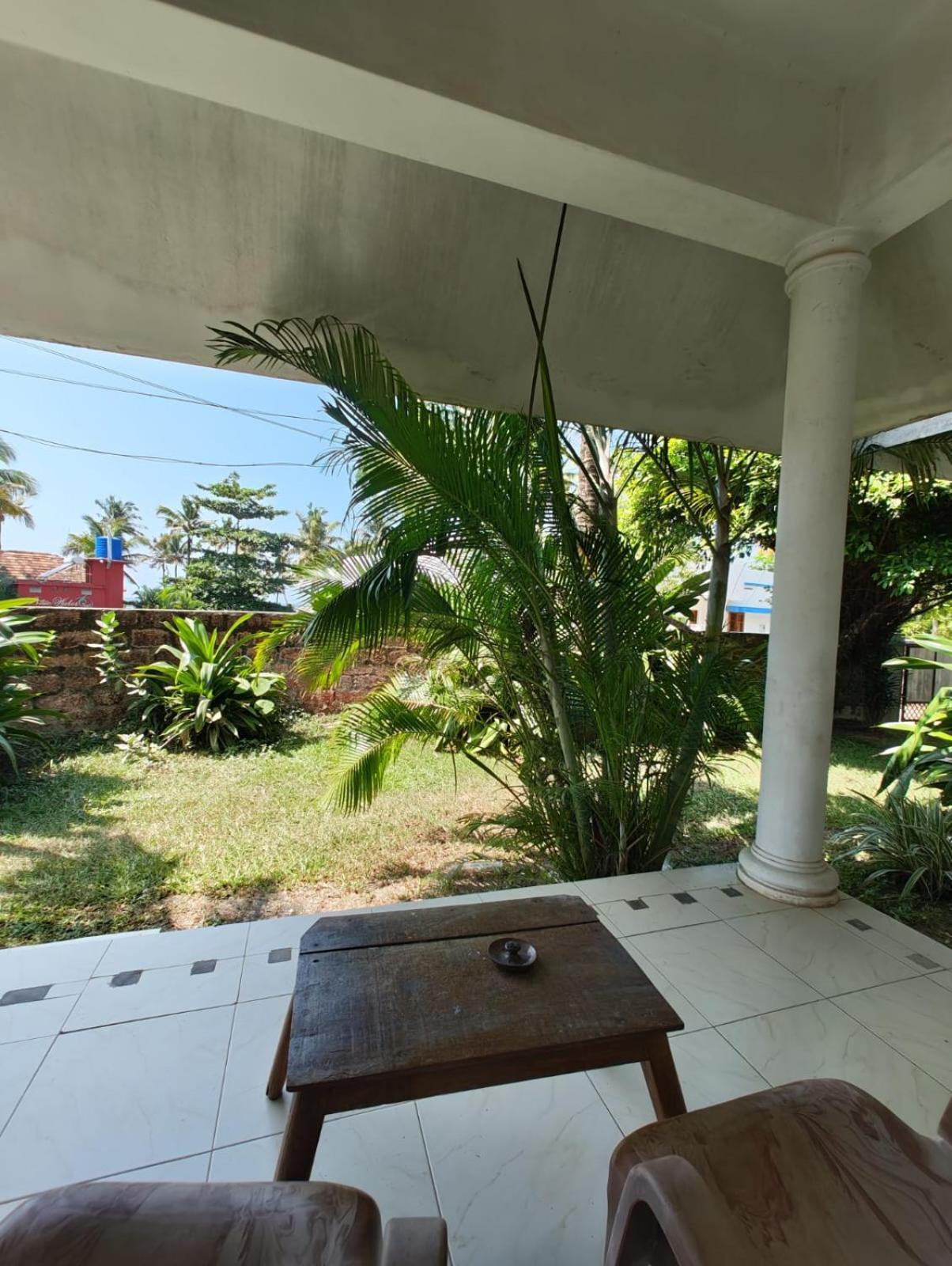 Satta Beach Deluxe Varkala Værelse billede